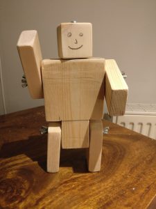 The simple wooden robot I designed for the Cubs.