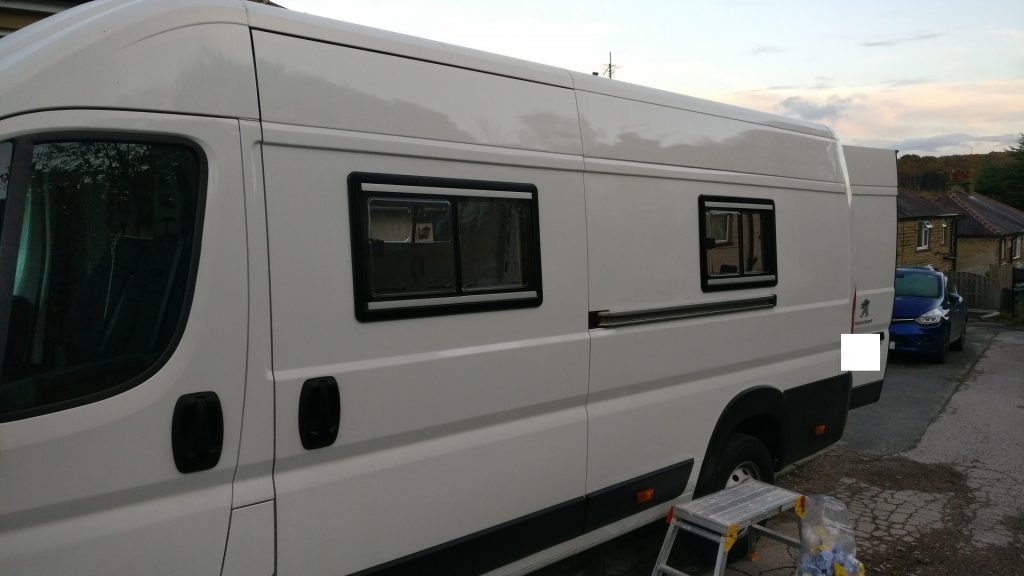 Two windows fitted in the side