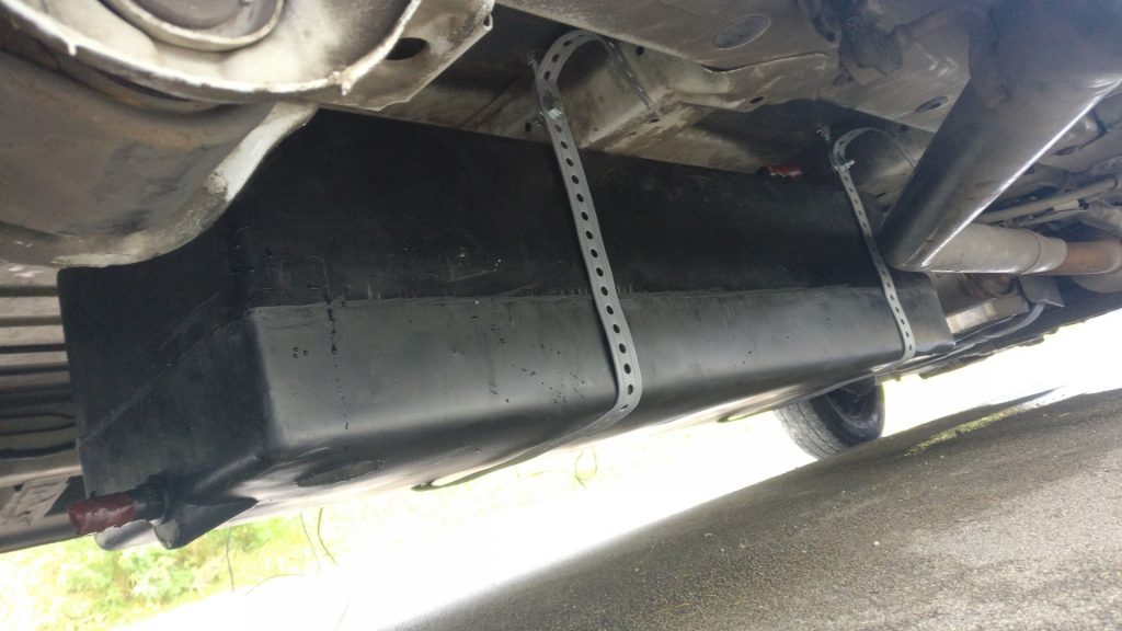 One of the underslung water tanks underneath the van