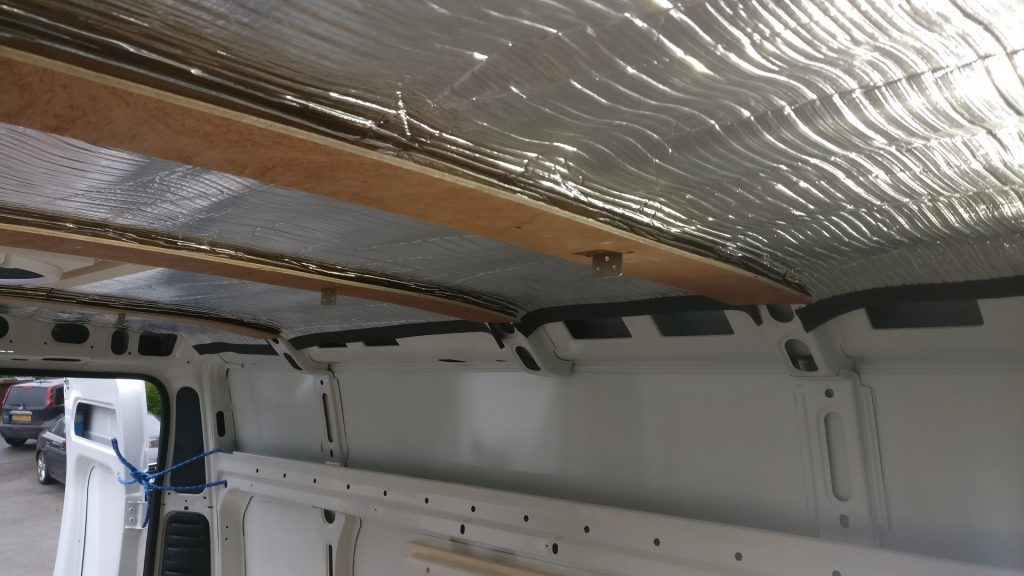 Plywood strips stuck on the roof battens, which hold the ceiling up, along with the ceiling insulation