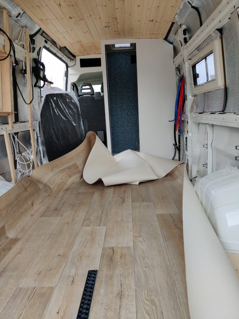 Vinyl floor covering laid loosely in the van